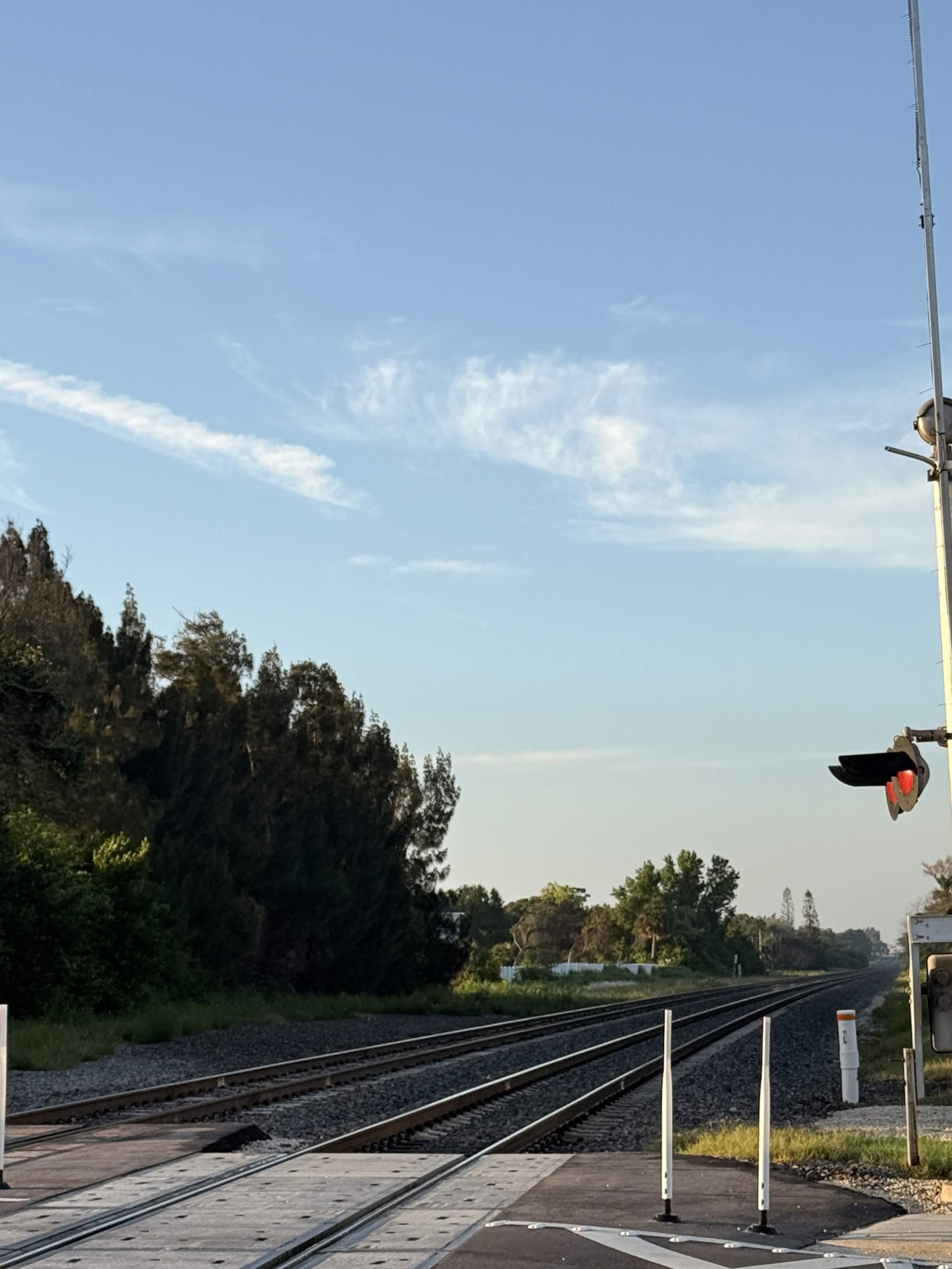 Railroad crossing on the morning route, Melbourne FL