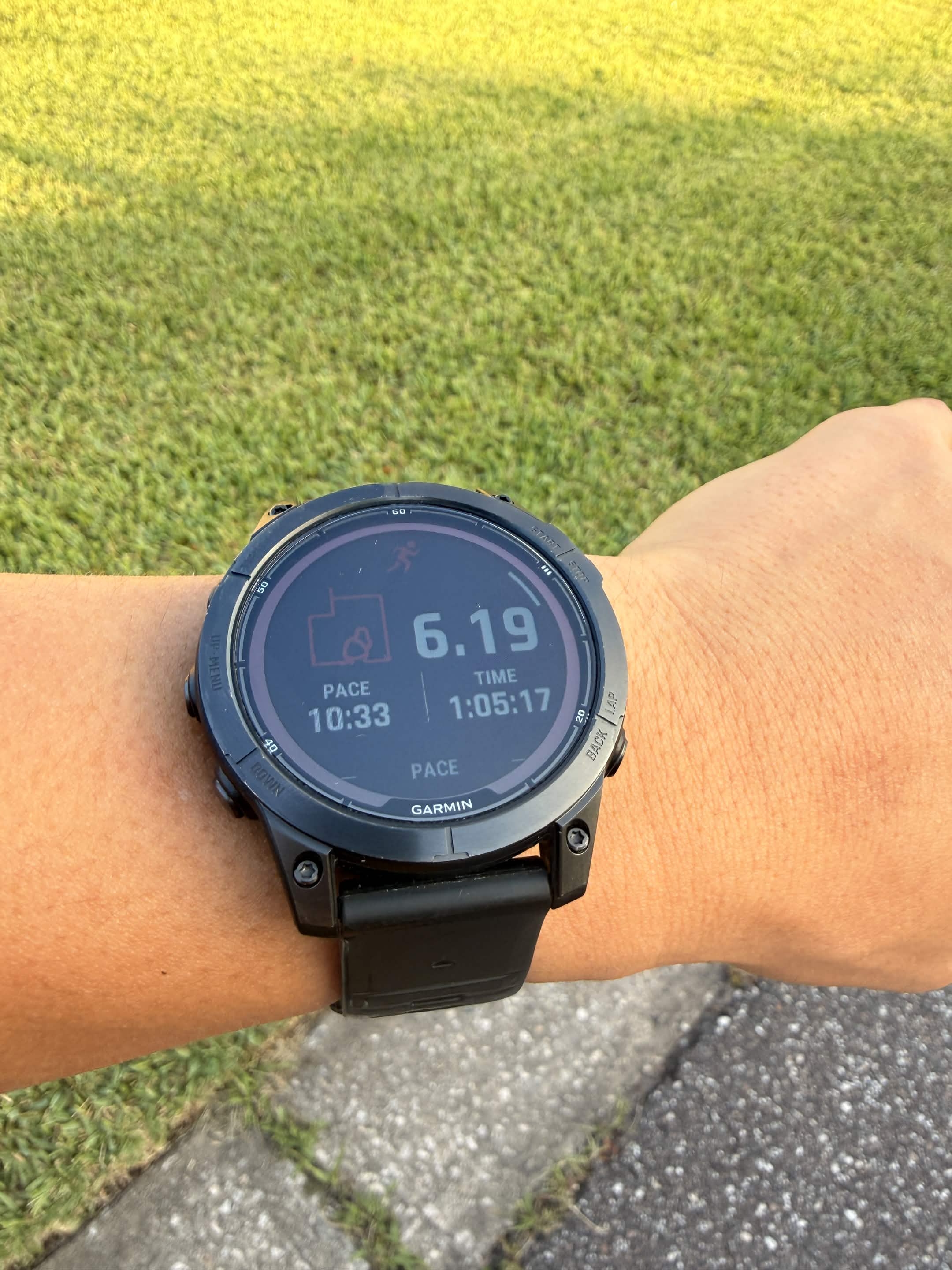 Garmin Fenix showing 6.19 miles, 10:33 pace, 1:05:17 on a quiet June morning.